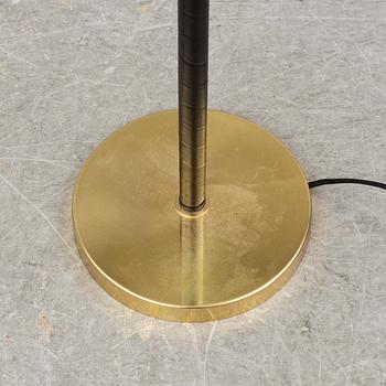 JOSEF FRANK, a brass and leather wrapped floor lamp, model 1838, from Firma Svenskt Tenn.