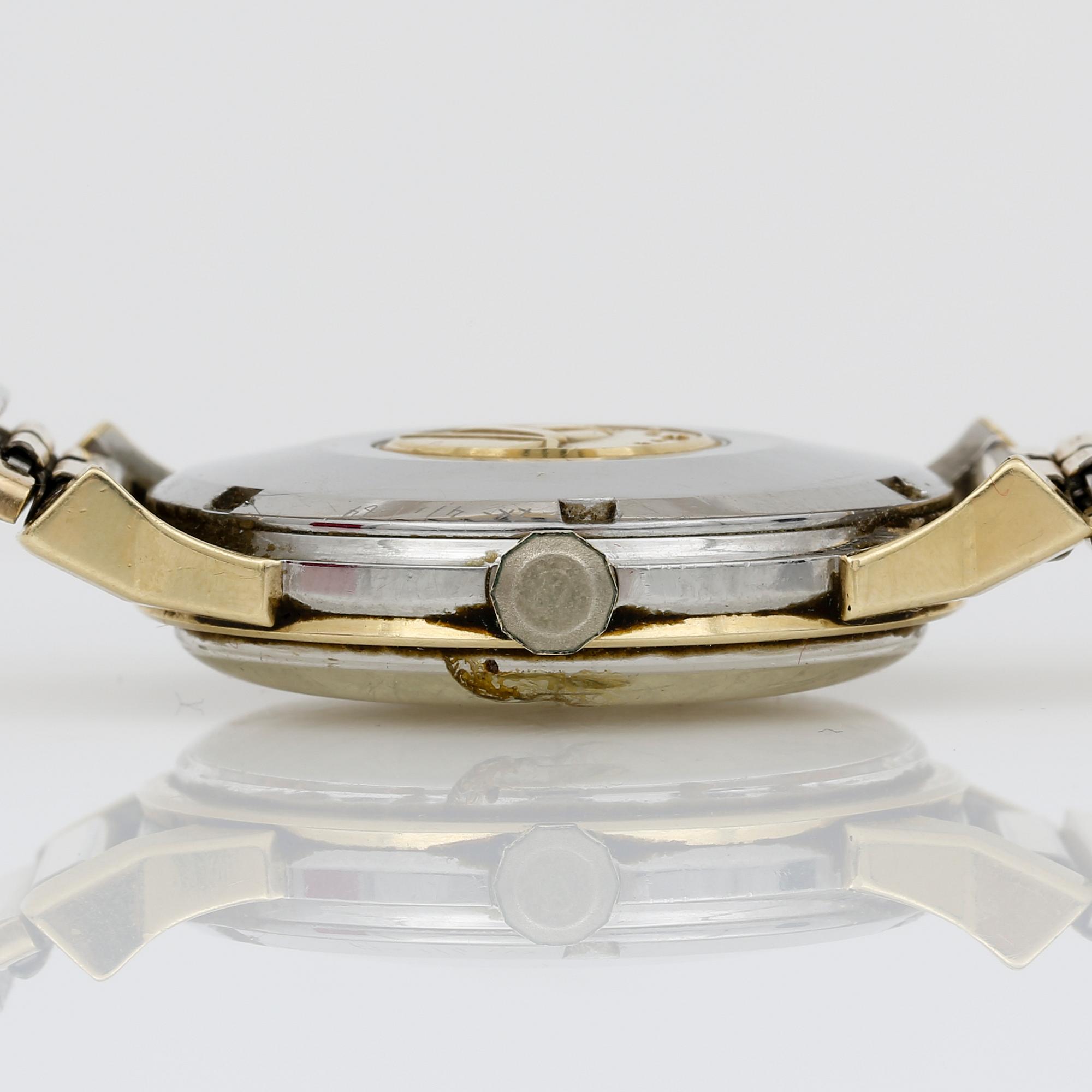 ARMBANDSUR, Omega Constellation.
