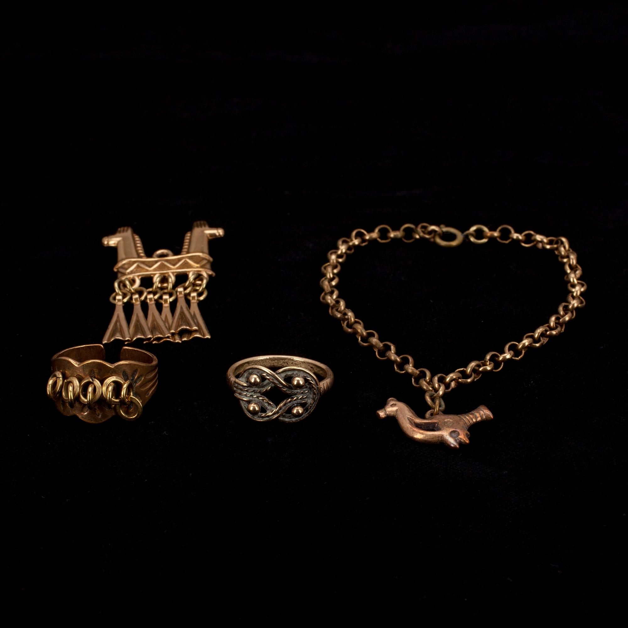 SMYCKEN, 4 st, brons, Kalevala Koru. 1900-talets senare hälft.