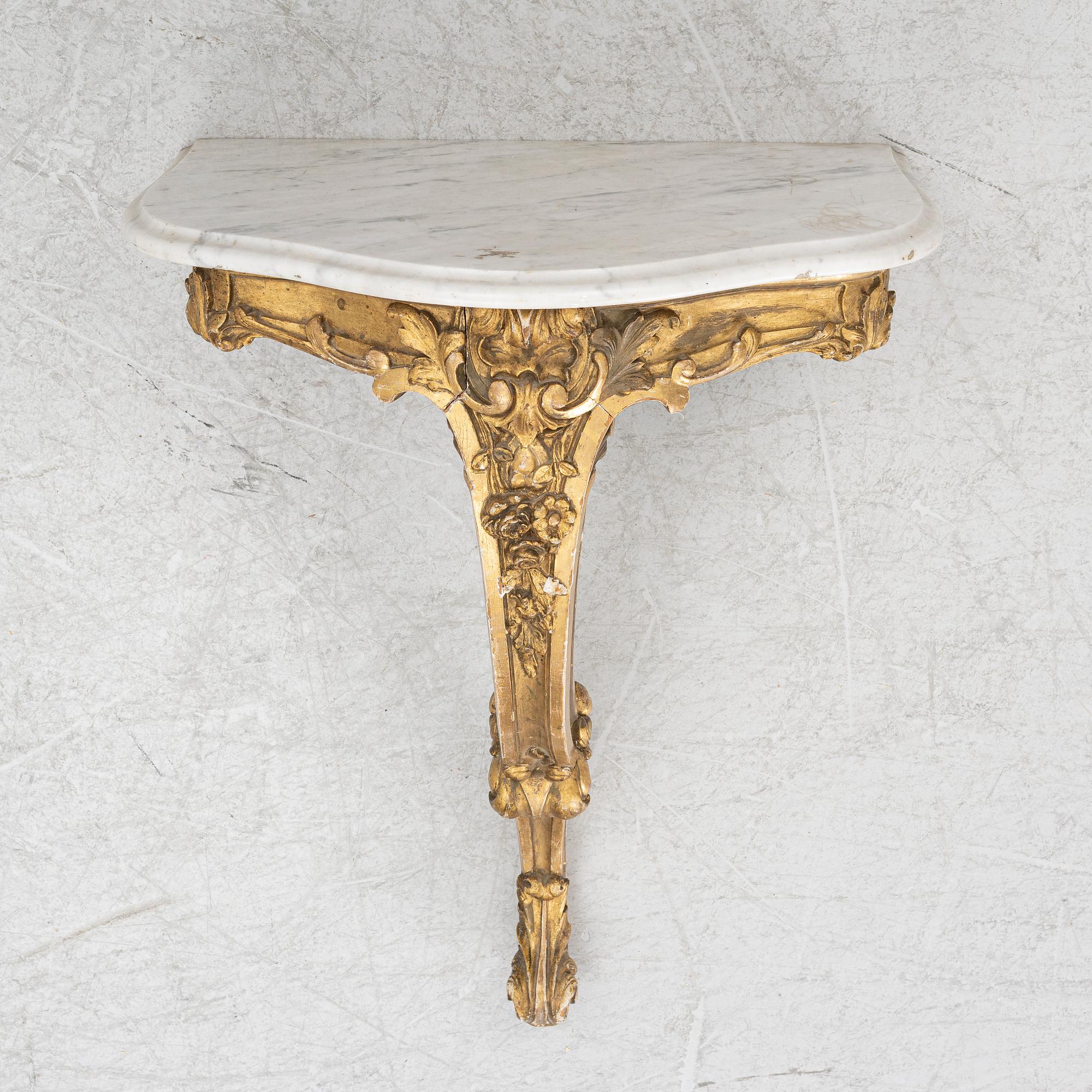 A Swedish rococo-style console table, 19th century.