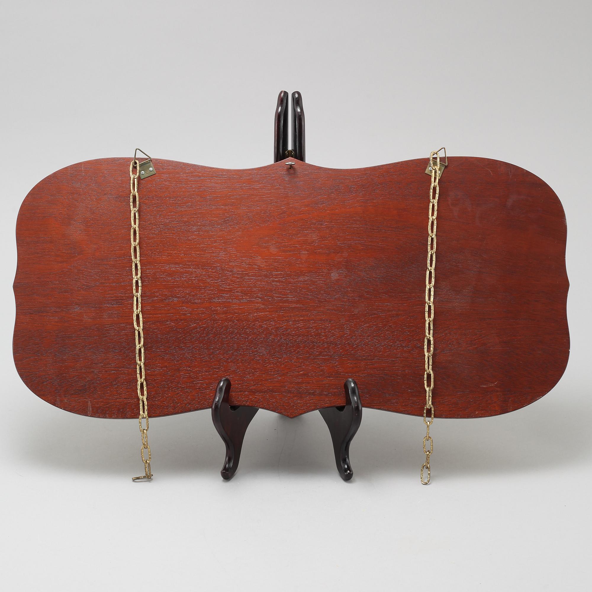 A wall clock and a barometer from Schatz.