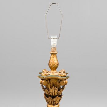 A Baroque style 1920s standard lamp.