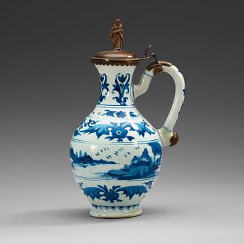 A blue and white Transitional ewer, 17th Century.