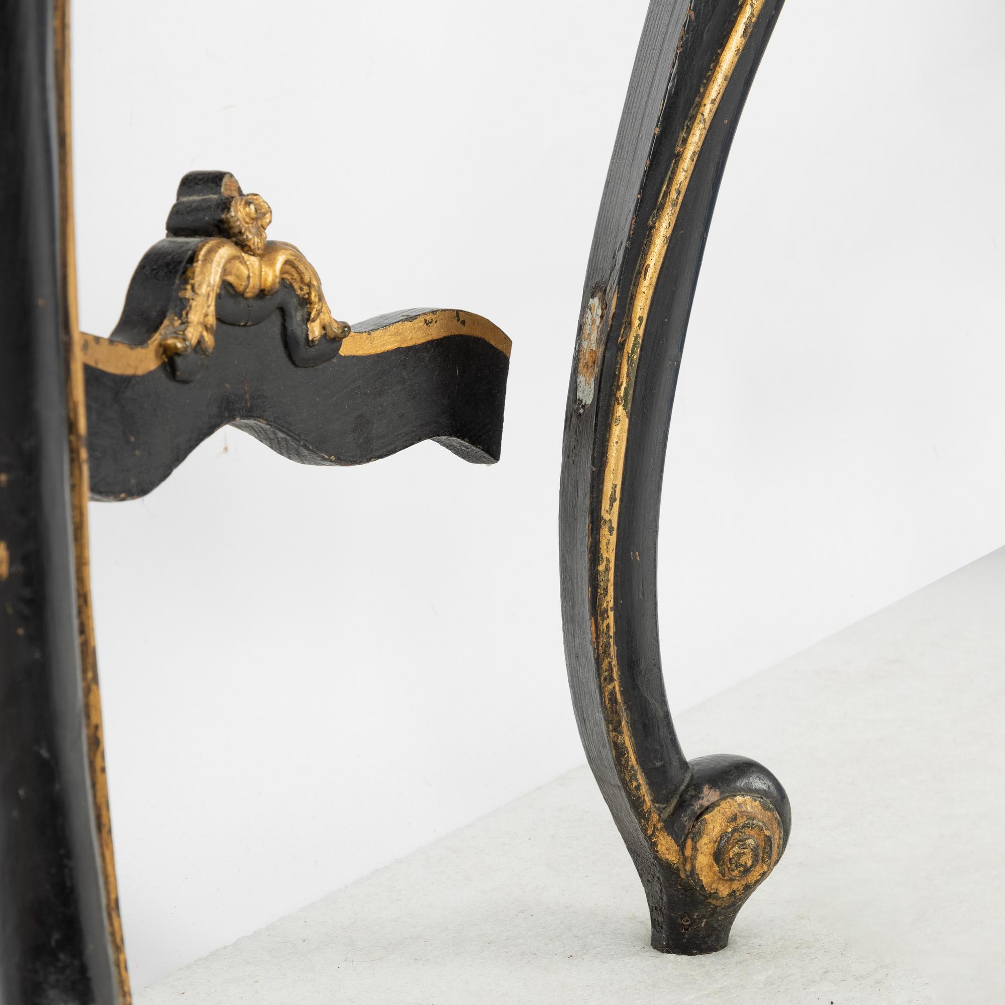 A Rococo revival mirror and a console table, second half of the 20th Century.