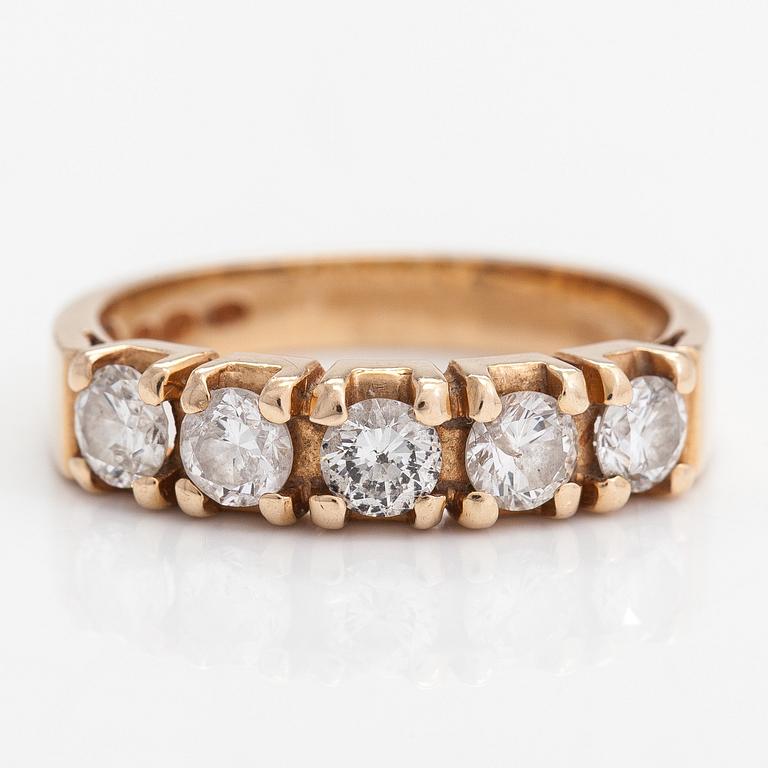 A 14K gold ring set with brilliant-cut diamonds approx. 0.75 ct in total, 2009.
