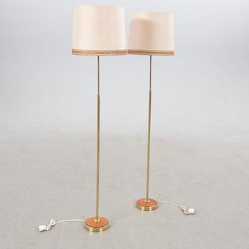 Floor lamps, a pair, mid-20th century.