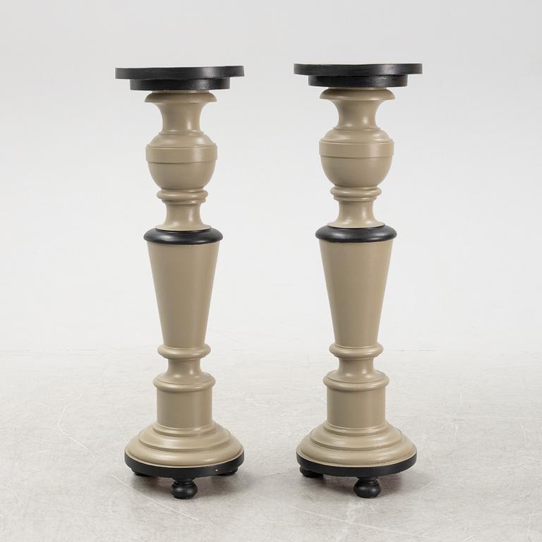 A pair of wooden piedestals, 20th Century.