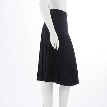 CÉLINE, a blue woolblend pleated skirt. Size 44.