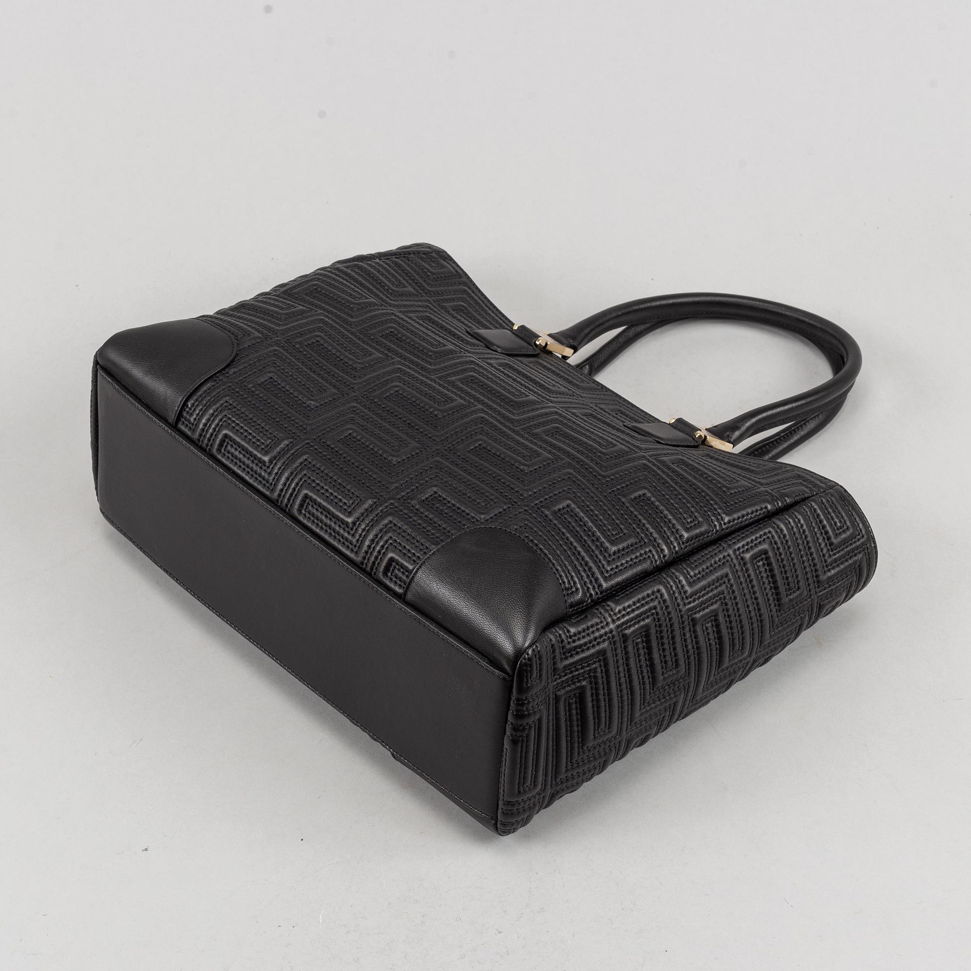 Versace, a black quilted leather handbag.