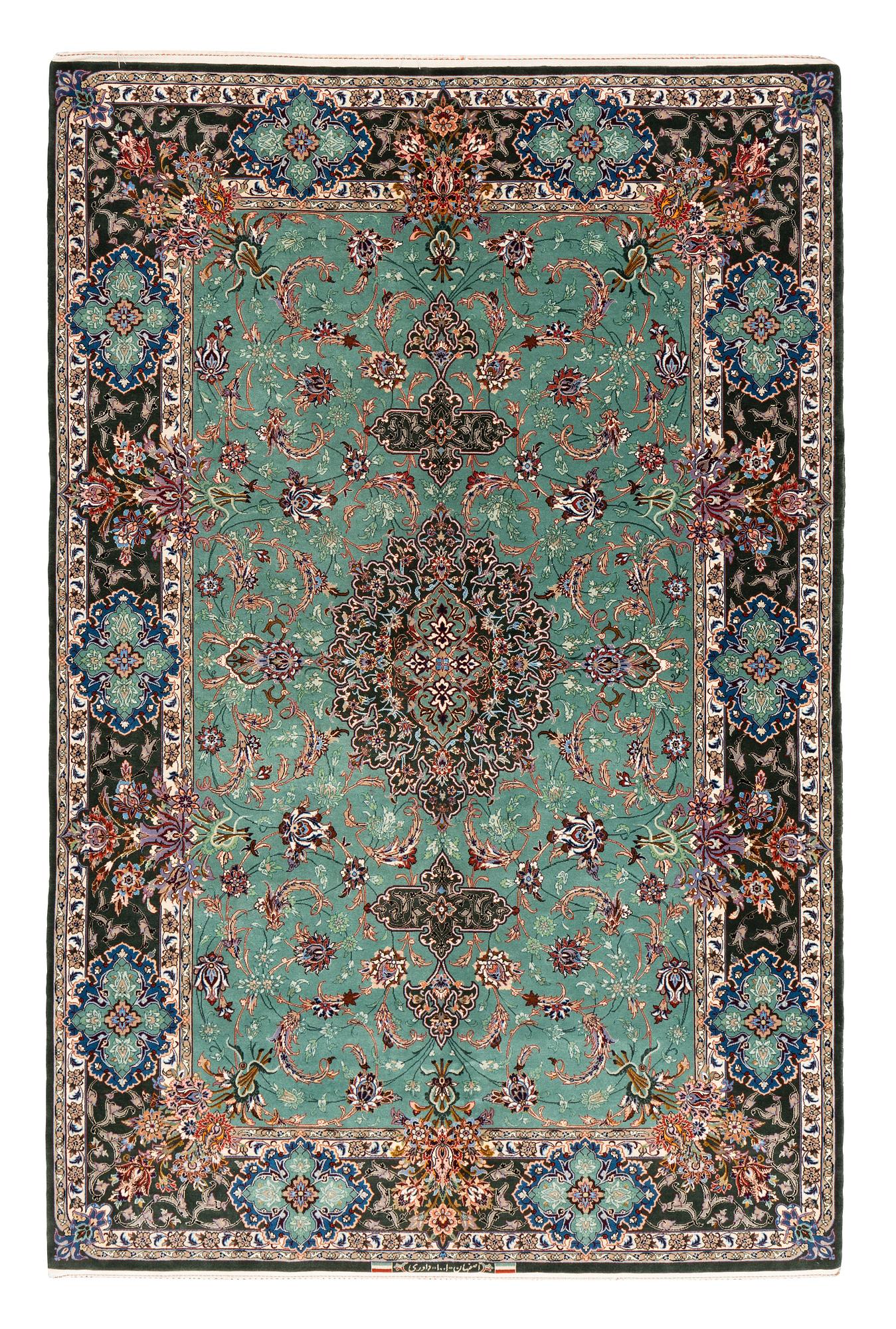 A rug, old Esfahan, part silk, signed, ca 225 x 149 cm (ca 1,5-2,5 cm flat weave at the ends).
