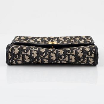 Christian Dior, a canvas handbag.