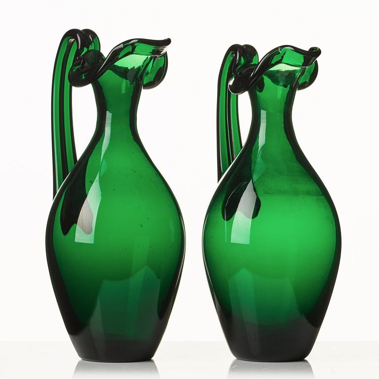 Edward Hald, two emerald green claret jugs, Sandvik's glassworks, Sweden ca 1929, model HS 1021.