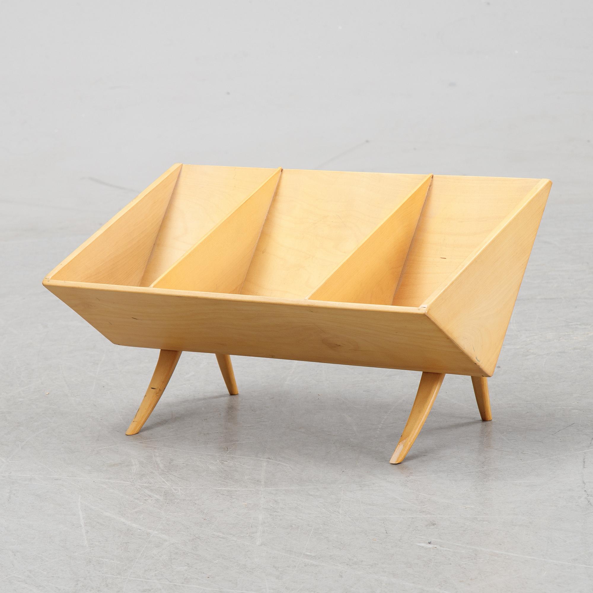 A model T 709 book stand by Bruno Mathsson for Firma Karl Mathsson, dated 1967.