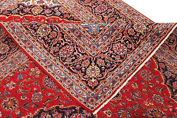 A Keshan carpet, c. 330 x 245 cm.