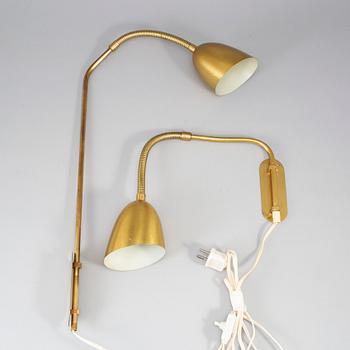 2 brass wall lights, JBE konst, Ystad, Sweden second half of the 20th century.