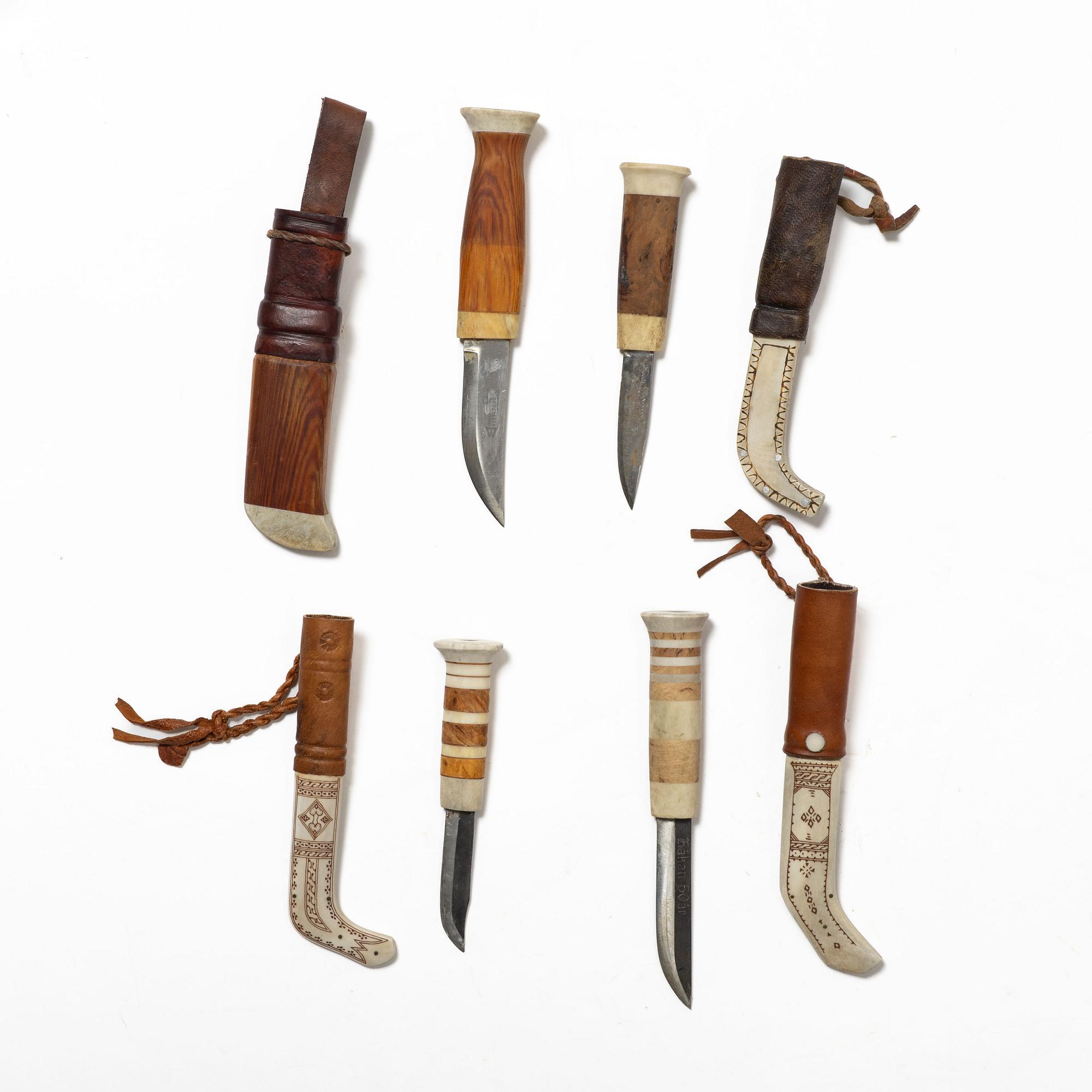 Eight knives, of which seven are half-horn knives, signed.