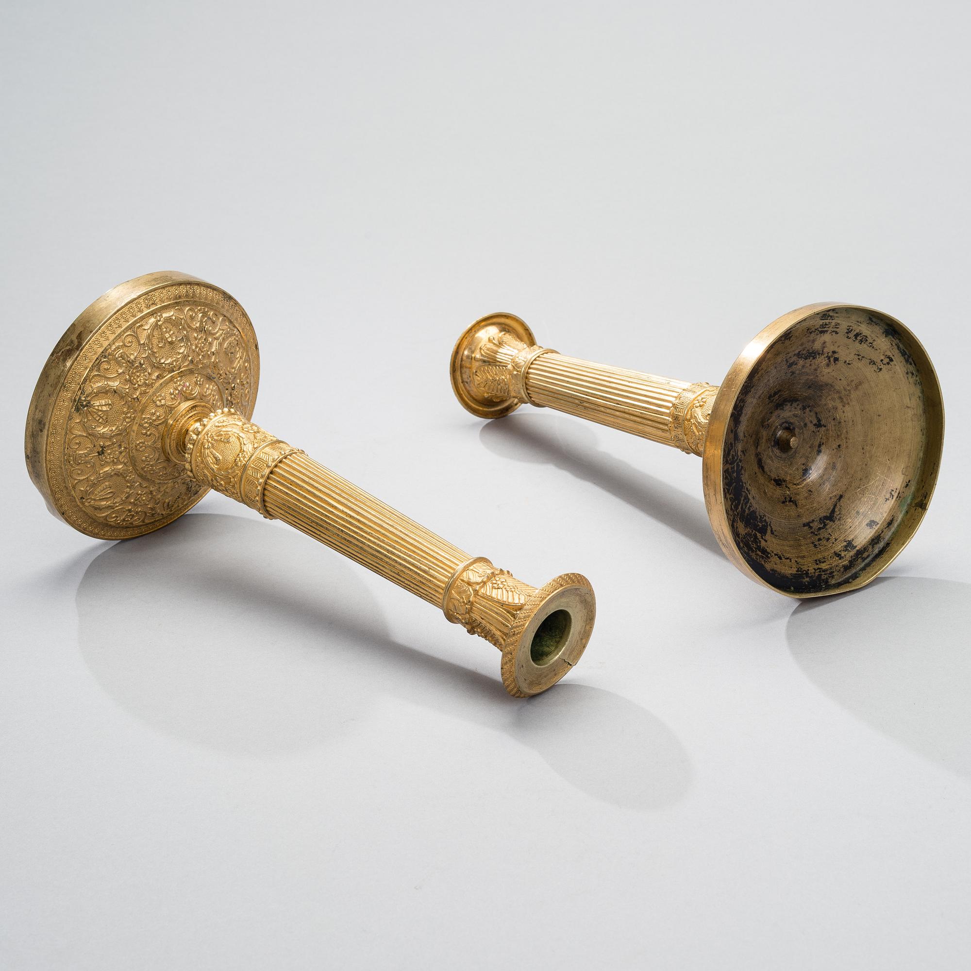 A PAIR OF CANDLESTICKS, gilt bronze, empire early 19th century.
