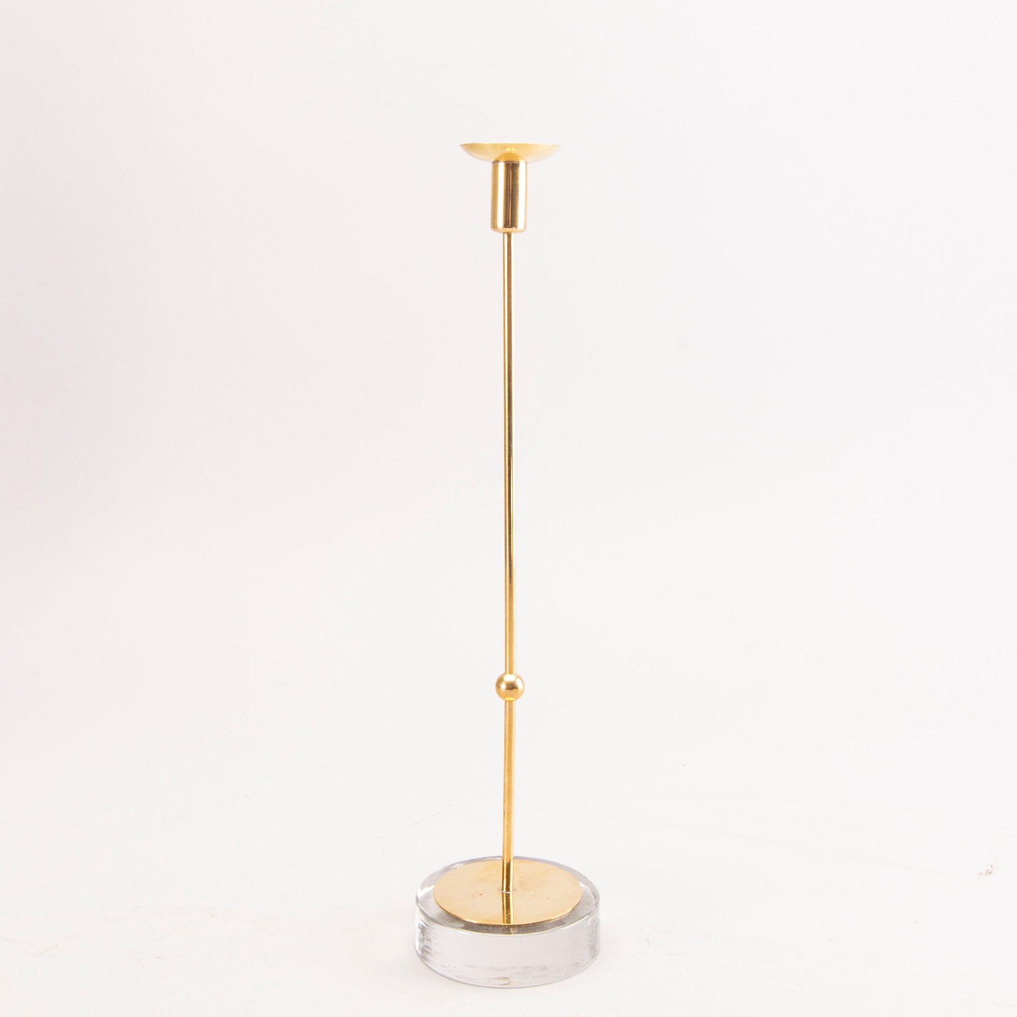 Gunnar Ander, a set of five different brass and glass candle sticks from Ystad Metall mid 1900s/second part.