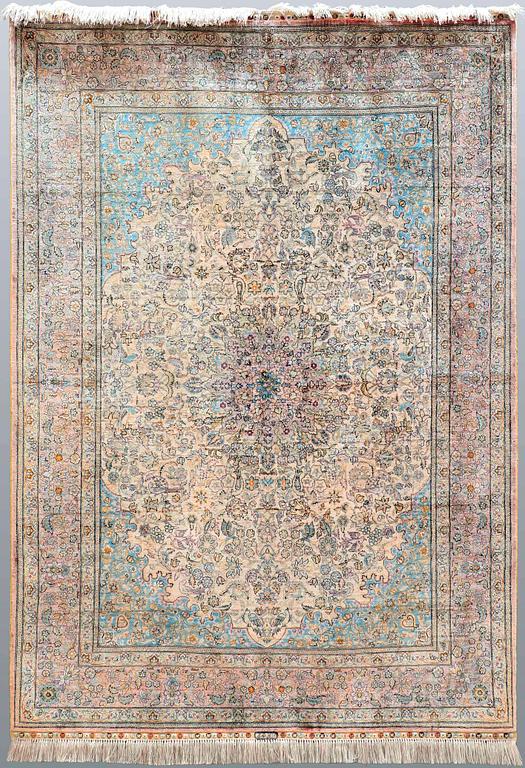 A rug, Figural Oriental silk,  signed, ca 175 x 125 cm.