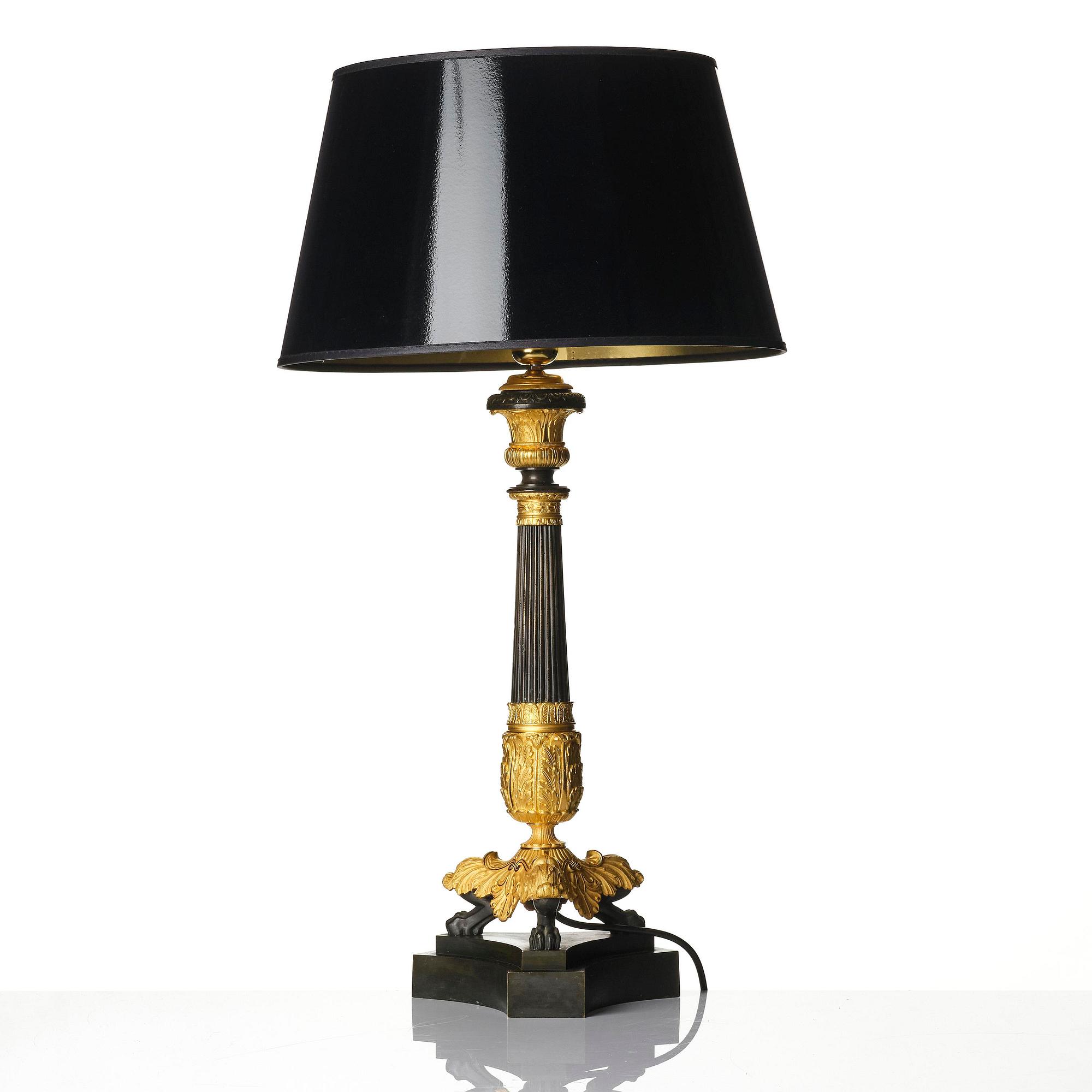 A French Louis Philippe ormolu and patinated bronze lamp, first part 19th century.
