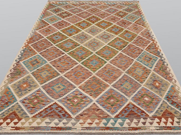 A Kilim carpet, approx. 303 x 201 cm.