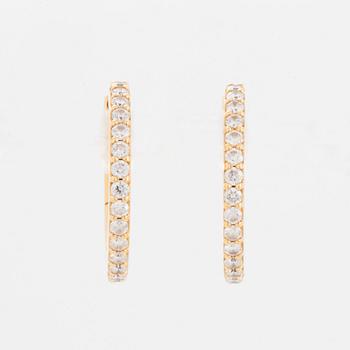 A pair of Ole Lynggaard earrings "Love" in 18K gold set with round brilliant-cut diamonds.