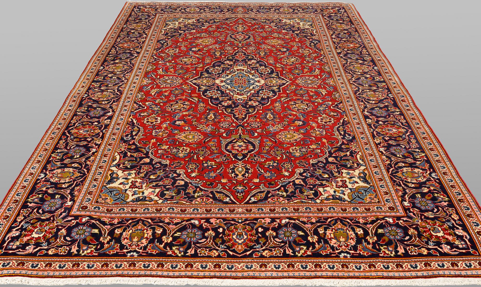 A Keshan rug, approx. 305 x 194 cm.