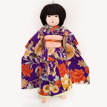 A large Japanese doll, early 20th Century.