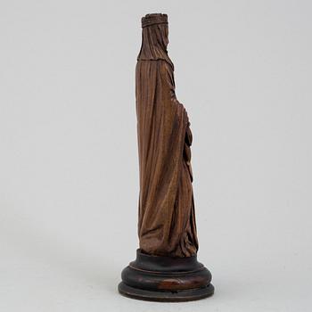 AN 18TH CENTURY CARVED WOOD SCULPTURE.