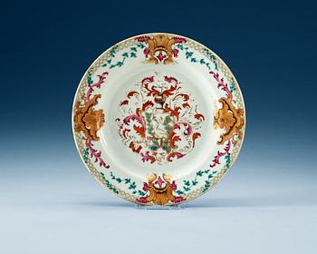 1675. A famille rose armorial dinner plate with the arms of Grill, Qing dynasty, Qianlong (1736-95).