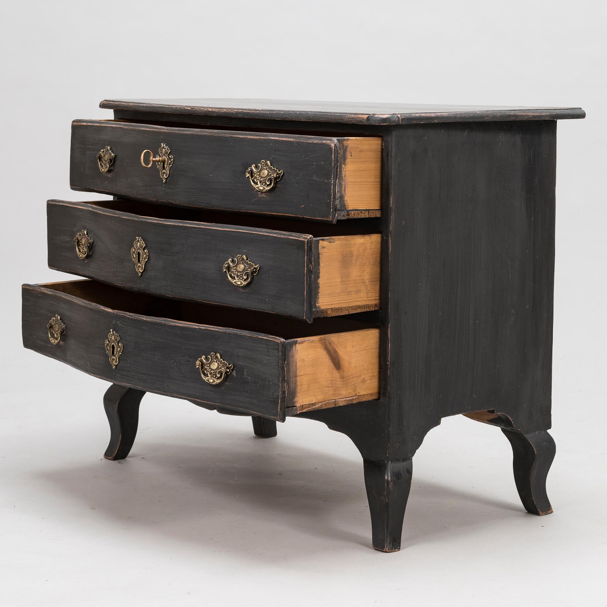 An 18th-Century chest of drawers.