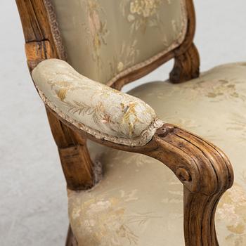 A Pair of Louis XV Beechwood Armchairs, 18th Century.