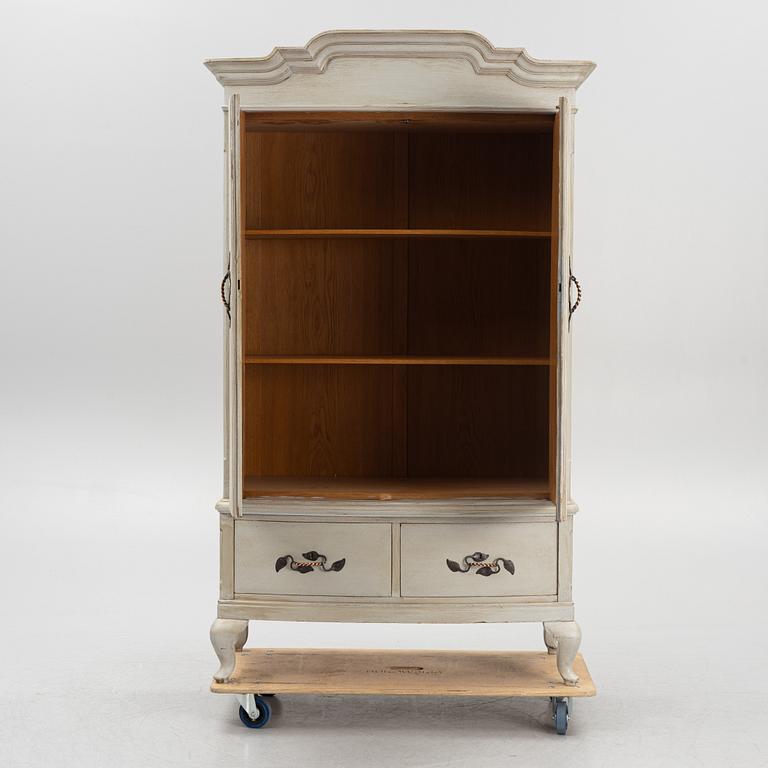 A cabinet, early 20th Century.