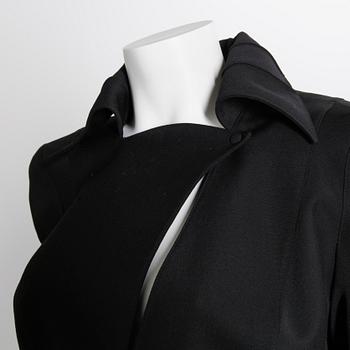 THIERRY MUGLER, a two-piece suit consisting of jacket and skirt, size 42.