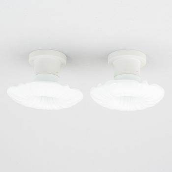 Harald Notini, a pair of ceiling/wall lamps model "6387", Arvid Böhlmarks Lampfabrik, Stockholm, 1920s-30s.