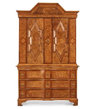 1. A Swedish Fredrik I burr-alder cabinet, first part of the 18th century.