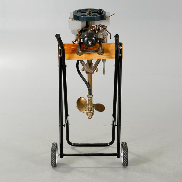 An early 20th century rowboat motor 
by Evinrude Detachable Rowboat Motor Company,
Milwaukee in Wisconsin.