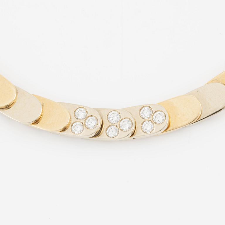 Gio Caroli, collier, 18K guld med nio briljantslipade diamanter.