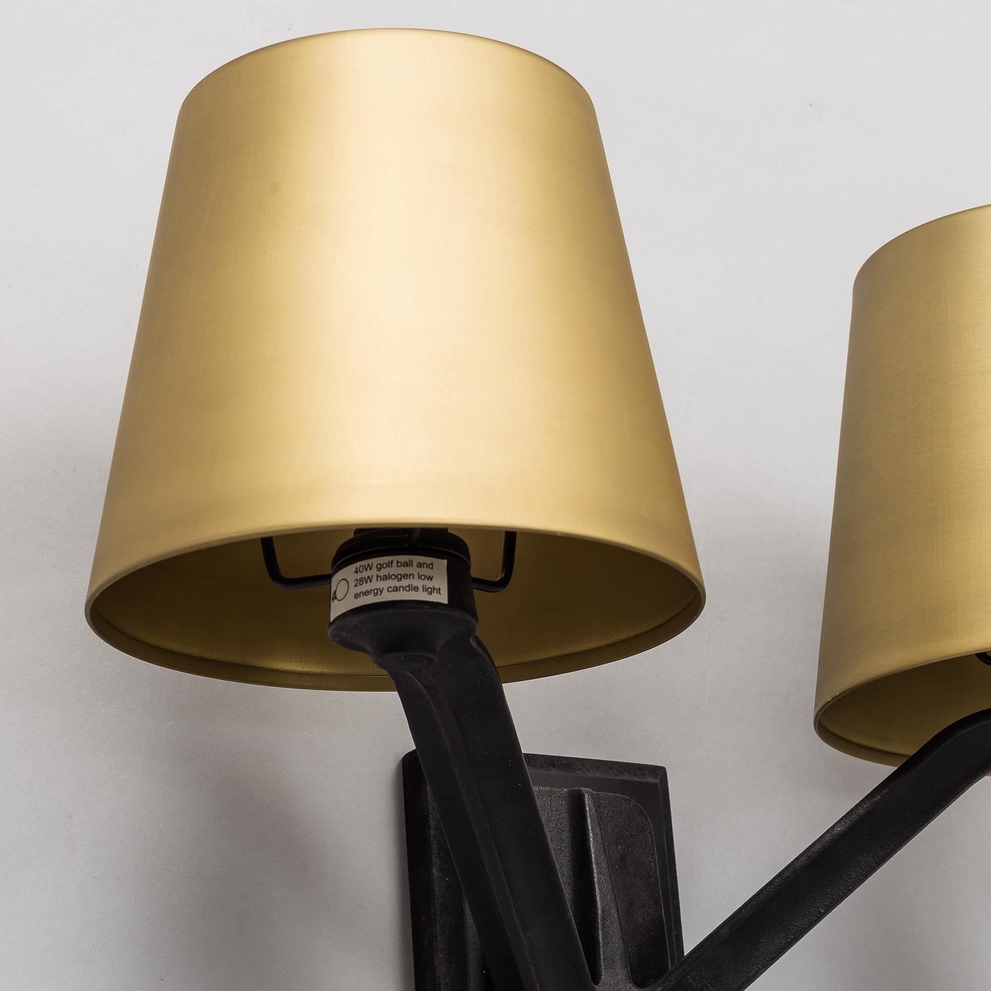 TOM DIXON a pair of Base wall light. Bukowskis
