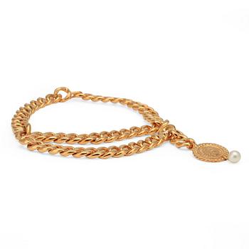CHANEL, a necklace.