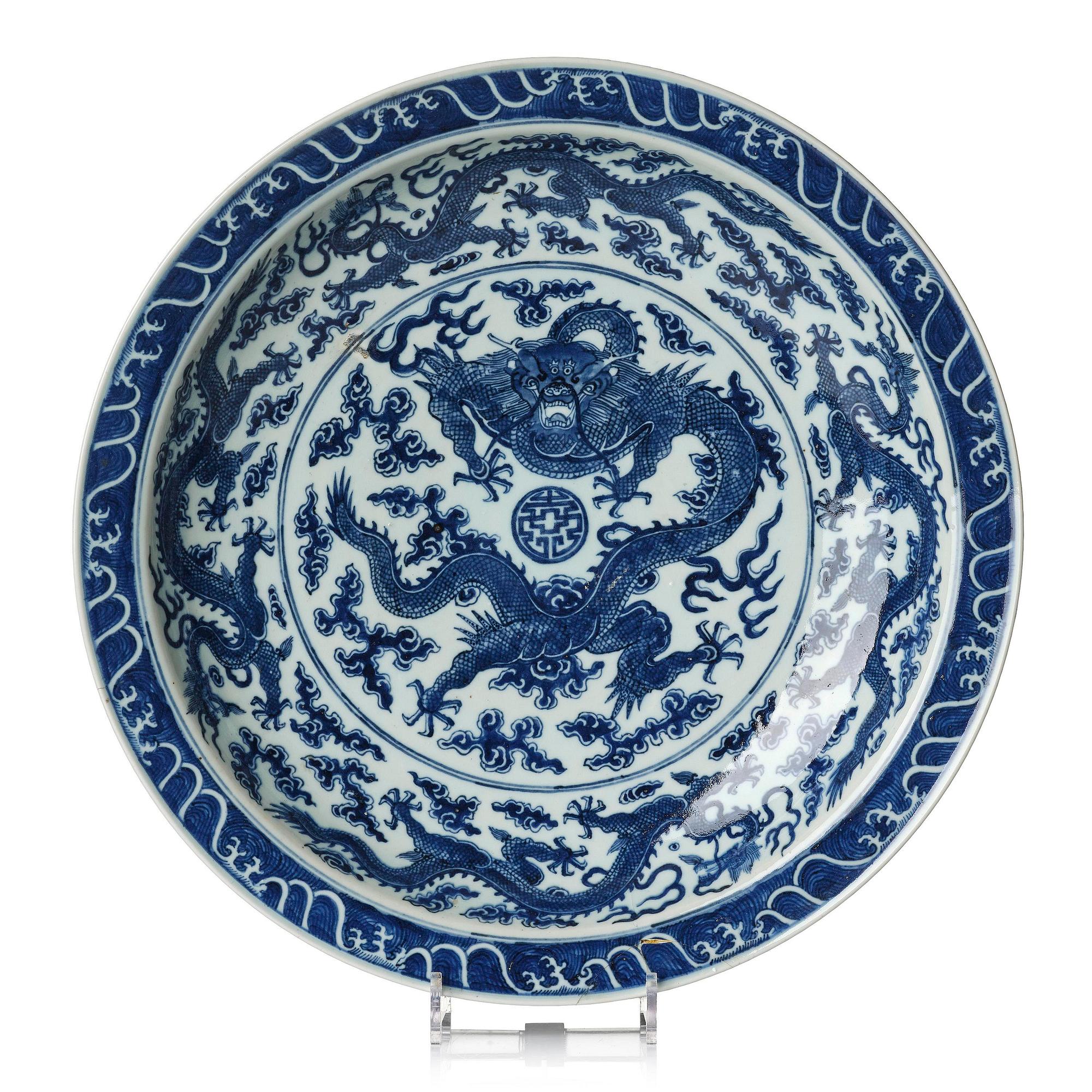 A large blue and white 'dragon' charger, late Qing dynasty/Republic with an apocryphal Yongzheng mark.