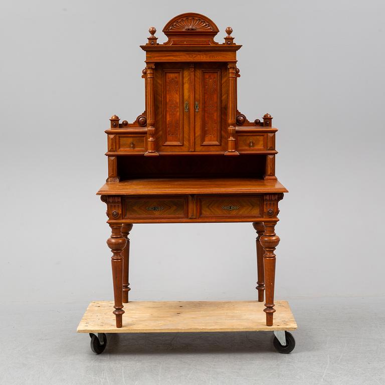 A late 19th century walnut veneered desk.