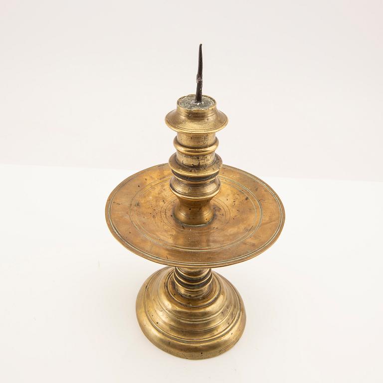 Candle holder possibly from the 17th century, brass.