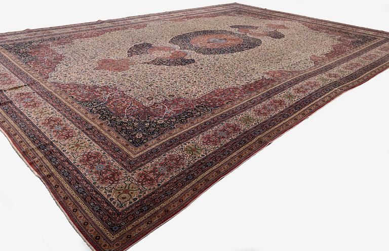 A semi-antique Hereke carpet, Western Turkey, c. 685 x 489 cm.