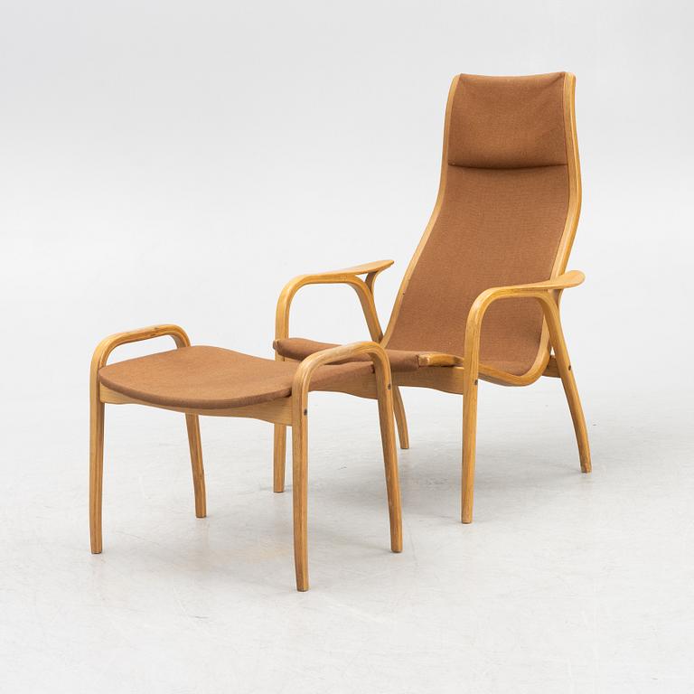 Yngve Ekström, a 'Lamino' easy chair and a foot stool, Swedese.