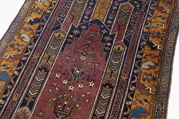 An Anatolian prayer rug, semi-antique, c. 205 x 115 cm.