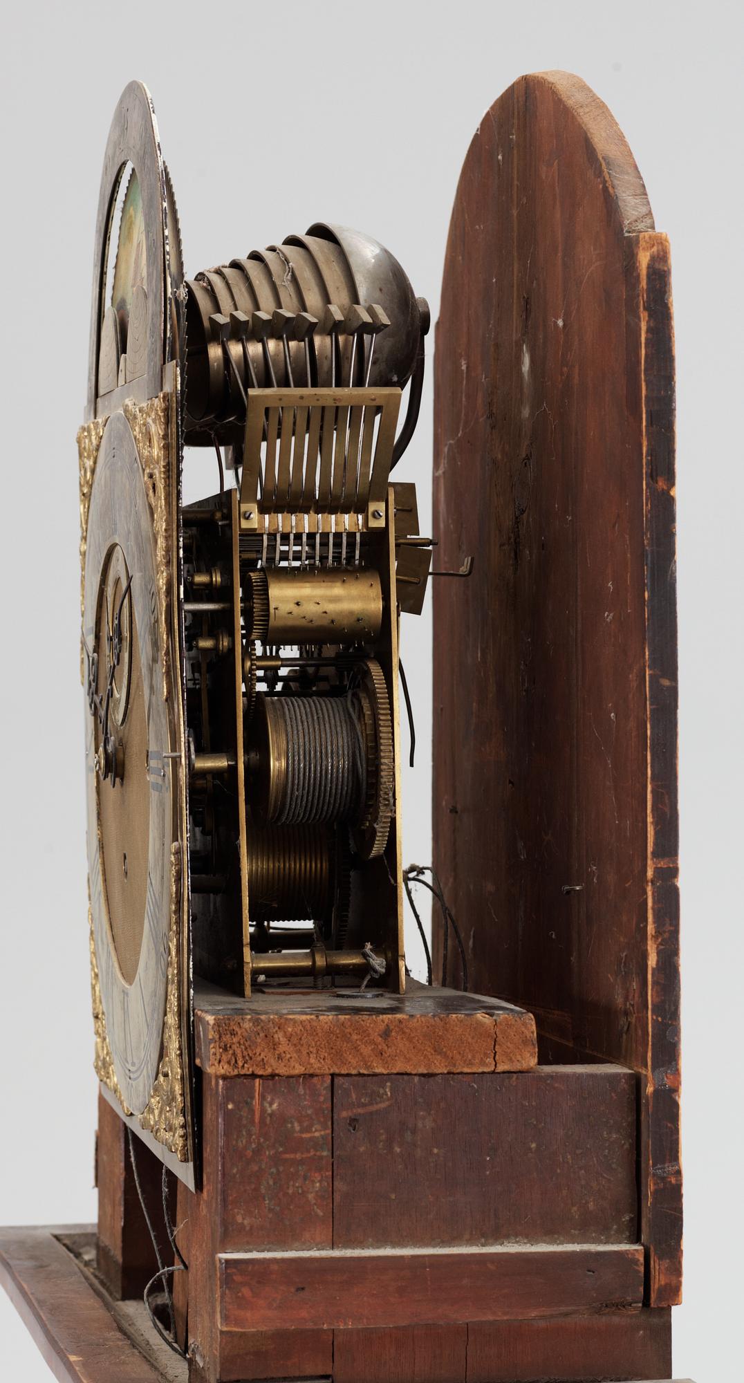 An English circa 1800 mahogany veneer longcase clock.