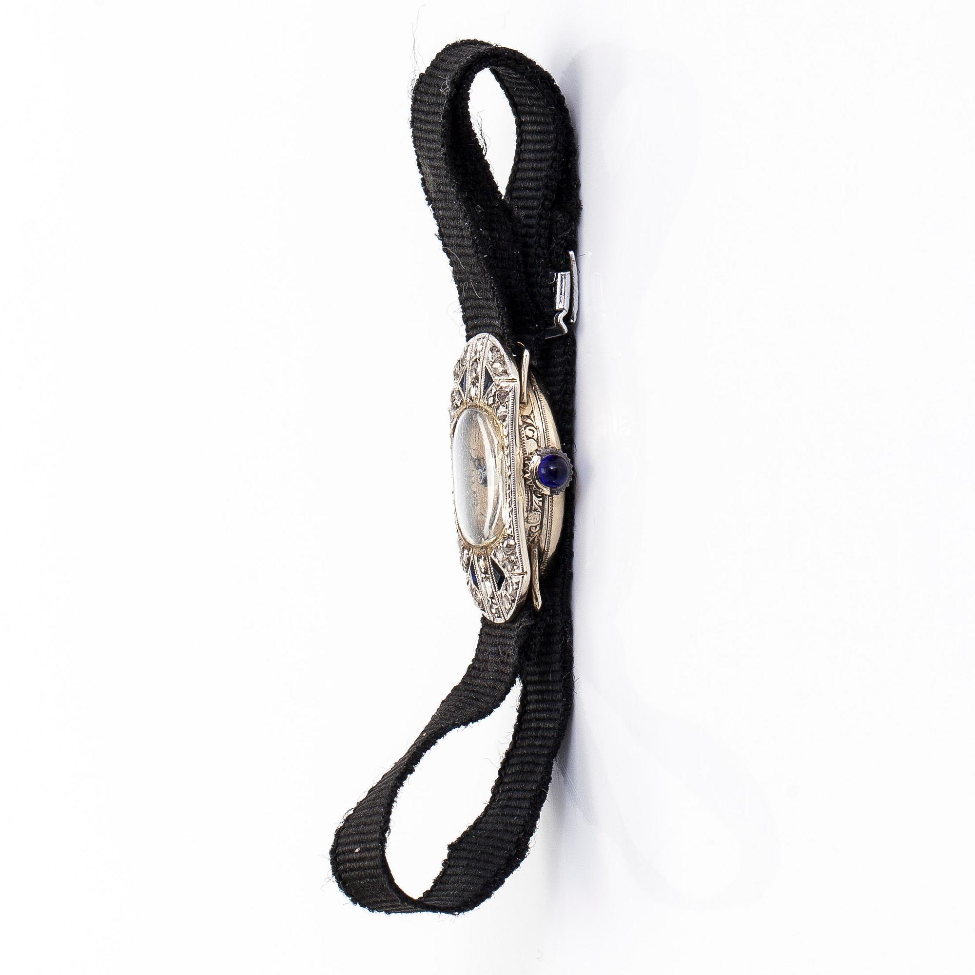 Wristwatch, 25 x 13 mm, Art Deco, rose cut diamonds, faceted sapphires, 18K white gold.