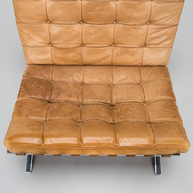 A Ludwig Mies van der Rohe "Barcelona" chair.