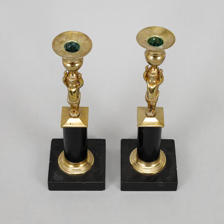 A pair of late gustavian candlesticks, circa 1800.